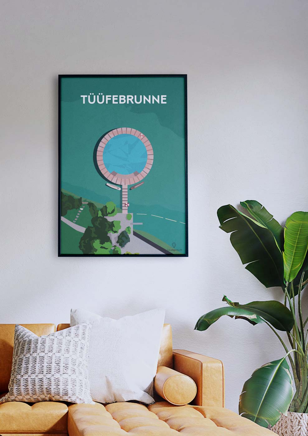 Ein Wohnzimmer mit einer Couch und einem Poster von Tüüfebrunne.